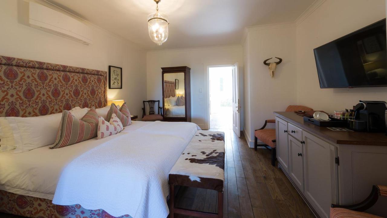 Drostdy Hotel Graaff-Reinet Exteriör bild A bedroom at the hotel