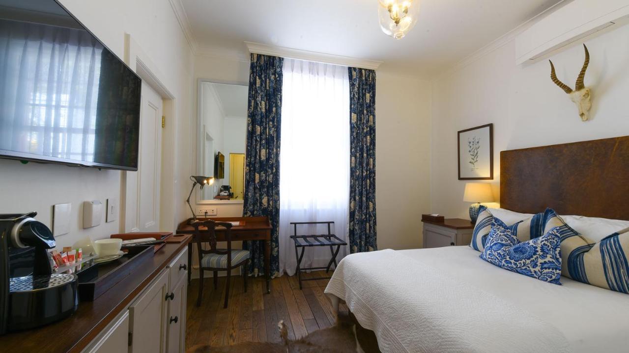 Drostdy Hotel Graaff-Reinet Exteriör bild A room at the hotel
